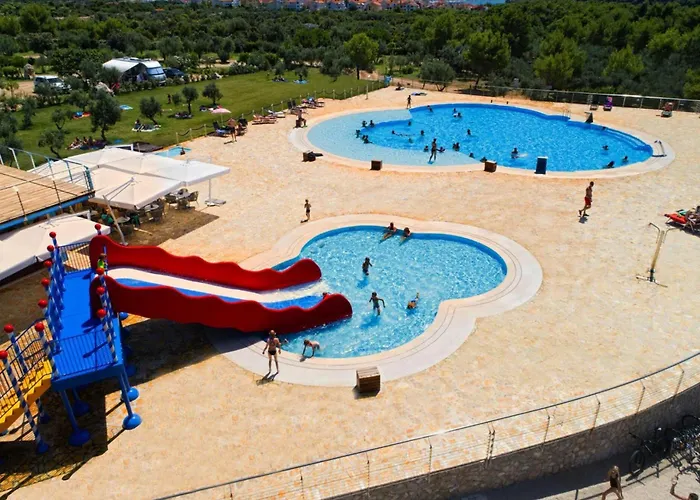Mobile Homes In Camp Kovacine, Cres, With Long Pebble *